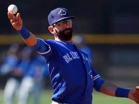 Blue Jays right fielder Jose Bautista will ease his way into the lineup and won't play in any spring-training games for a week to 10 days. (Butch Dill/USA TODAY Sports)