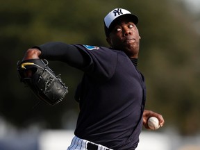 New York Yankees relief pitcher Aroldis Chapman (54) pitches in live batting practice at George M. Steinbrenner Stadium. Butch Dill-USA TODAY Sports