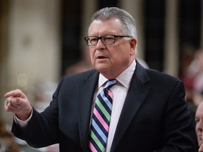 Public Safety Minister Ralph Goodale responds to a question during Question Period in the House of Commons Wednesday February 24, 2016 in Ottawa. Opposition parties say they deserve a seat at the table as the Liberals put together a watchdog committee on national security and intelligence. THE CANADIAN PRESS/Adrian Wyld
