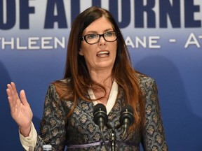 Pennsylvania Attorney General Kathleen Kane speaks about the 147-page report on sexual abuse in the Altoona-Johnstown Diocese was made public at a news conference, Tuesday, March 1, 2015 in Altoona, Pa. Kane says none of the alleged criminal acts can be prosecuted because some abusers have died, statutes of limitations have run their course and victims are too traumatized to testify.  (J.D. Cavrich/Altoona Mirror via AP)