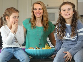 Michelle Vodrazka with her two daughters, Noelle, left and Maya. JULIE OLIVER/POSTMEDIA