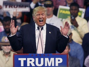 Republican U.S. presidential candidate Donald Trump speaks at a campaign rally at Valdosta State University in Valdosta, Georgia February 29, 2016. (REUTERS/ Philip Sears)