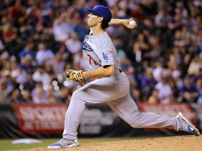 Josh Ravin #71 of the Los Angeles Dodgers delivers against the Colorado Rockies as he in the win in game two of a double header at Coors Field on June 2, 2015 in Denver, Colorado. The Dodgers defeated the Rockies 9-8.   Doug Pensinger/Getty Images/AFP