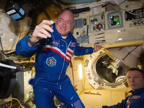NASA astronaut Scott Kelly is shown with flight engineer Sergey Volkov (R) from the International Space Station in this NASA image released on February 29, 2016. (REUTERS/NASA/Handout)