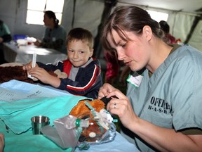 Teddy bears are diagnosed and patched up by volunteers at B.A.S.H. (Bear Ambulatory Surgical Hospital ) at the CHEO Teddy Bear Picnic. JANA CHYTILOVA/POSTMEDIA