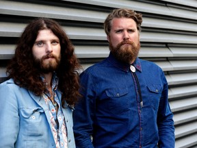The Sheepdogs, including Ewan Currie, right, and Ryan Gullen, play the London Music Hall on Friday. (Craig Robertson, POSTMEDIA NEWS)