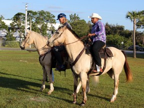 New York Mets Yoenis Cespedes, right, and Noah Syndergaard ride horses at the team’s spring training facility, Tuesday, March 1, 2016, in Port St. Lucia, Fla. (Will Carafello/New York Mets via AP)