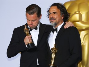 Leonardo DiCaprio, Best Actor winner for his role in "The Revenant", and Best Director winner Alejandro G. Inarritu (R) for "The Revenant" pose with their Oscars together backstage at the 88th Academy Awards in Hollywood, California February 28, 2016.    REUTERS/Mike Blake TPX IMAGES OF THE DAY