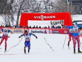 Russia’s Sergey Ustiugov (No. 3) beats out France’s Richard Jouve (No. 28) for the men’s sprint gold on March 1 in the opening stage of Ski Tour Canada in Gatineau. (Jean Levac, Postmedia Network)