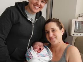 Proud parents Tara Simpson, left, and Ann Marie Andretta welcome their daughter, Francesca Joyce Andretta-Simpson, seen here at Kingston General Hospital on March 1. (Julia McKay/The Whig-Standard)