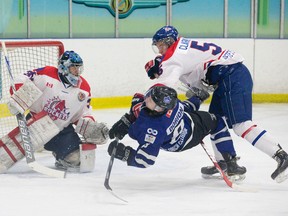 London Nationals forward Scott Dorion is checked by Strathroy Rockets defenceman Jeff Clarke during a GOJHL Western Conference game at Western Fair Sports Centre in January. The teams meet again at Western Fair Wednesday night in the opener of their quarterfinal series. (CRAIG GLOVER, The London Free Press)