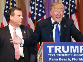 Republican U.S. presidential candidate Donald Trump, with former rival candidate Governor Chris Christie (L) at his side, speaks about the results of Super Tuesday primary and caucus voting during a news conference in Palm Beach, Florida March 1, 2016.   REUTERS/Scott Audette