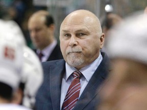 Washington Capitals head coach Barry Trotz watches play from the bench during first-period NHL action against the Dallas Stars in Dallas on Feb. 13, 2016. (AP Photo/LM Otero)