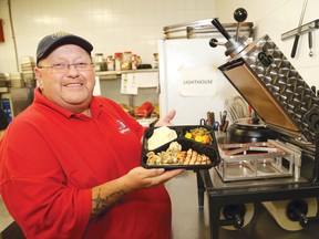 Sandy MacKean, chef/owner of the Lighthouse on Lasalle Boulevard in Sudbury, Ont., offers home meals customers can order. John Lappa/Sudbury Star/Postmedia Network