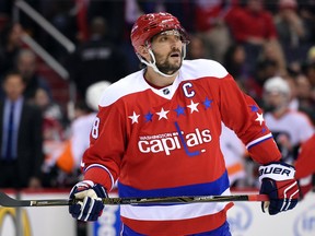 In this Jan. 27, 2016, file photo, Washington Capitals left wing Alex Ovechkin (8), of Russia, looks on during the first period of an NHL hockey game against the Philadelphia Flyers in Washington. Ovechkin and the  Capitals lead the NHL with 73 points out of the All-Star break. (AP Photo/Nick Wass, File)