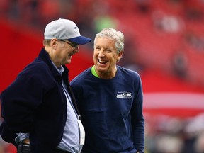 Seattle Seahawks head coach Pete Carroll (right) with team owner Paul Allen prior to the game against the Arizona Cardinals at University of Phoenix Stadium. Mark J. Rebilas-USA TODAY Sports
