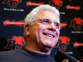 Head coach of the B.C Lions Wally Buono talks to media at the B.C Lions practice facility in Surrey, British Columbia, November 28, 2011. The B.C Lions beat the Winnipeg Blue Bombers yesterday to win the Grey Cup in Vancouver, B.C. REUTERS/Ben Nelms