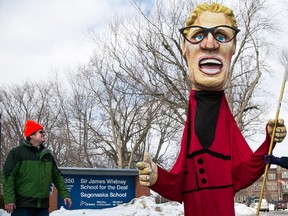 Tim Miller/Intelligencer File Photo
Daryl O’Grady, local president for the Ontario Public Service Employees Union (OPSEU), looks up at an effigy of Ontario Premier Kathleen Wynne in front of Sir James Whitney School for the Deaf and Sagonaska Demonstration school in Belleville during an OPSEU protest in front of the school on March 4, 2015.