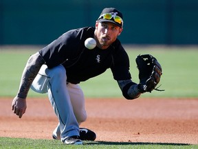 Chicago White Sox’s Brett Lawrie fields a ground ball during a spring training workout Wednesday, Feb. 24, 2016, in Glendale, Ariz. (AP Photo/Ross D. Franklin)