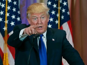 Republican U.S. presidential candidate Donald Trump reacts to the results of Super Tuesday primary and caucus voting during a news conference in Palm Beach, Florida March 1, 2016. (REUTERS/Scott Audette)