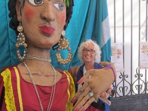 Columnist Merilyn Simonds in San Miguel, Mexico, with a giant female puppet celebrating International Women’s Week. (Supplied photo)