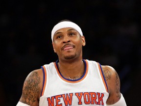Knicks forward Carmelo Anthony apologized for his reaction to a fan heckling the team during their game against the Trail Blazers in New York. (Adam Hunger/USA TODAY Sports)