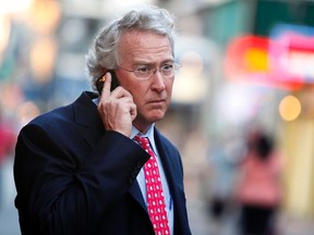 Chief Executive Officer, Chairman, and co-founder of Chesapeake Energy Corporation Aubrey McClendon walks through the French Quarter in New Orleans, Louisiana, in this March 26, 2012 file photo. To match Exclusive SANDRIDGE-CONTRACT/REUTERS/Sean Gardner/Files