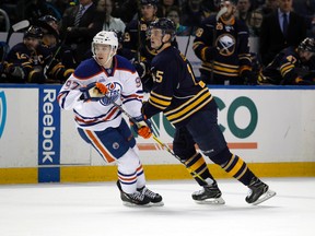 Edmonton Oilers centre Connor McDavid (97) and Buffalo Sabres centre Jack Eichel (15) follow the play during the second period at First Niagara Center Tuesday in Buffalo. (Timothy T. Ludwig/USA TODAY Sports)