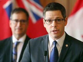 Mayor Brian Bowman (r) and finance chair Marty Morantz speak about the city budget during a press conference in Winnipeg, Man. Wednesday March 02, 2016.
Brian Donogh/Winnipeg Sun/Postmedia Network