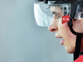 Team Canada captain Sidney Crosby watches from the bench during a drill at practice at the Olympics in Sochi, Russia on Feb. 18, 2014. (THE CANADIAN PRESS/Nathan Denette)