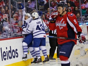 Toronto Maple Leafs right winger Nikita Soshnikov celebrates his first career goal with teammate Nazem Kadri during second-period NHL action against the Washington Capitals at the Verizon Center in Washington on March 2, 2016. (AP Photo/Alex Brandon)