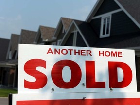 The rise in resale home sales comes as a bit of a relief to sellers after warnings there could be a cooling of the market for various reason. Sean Kilpatrick/CP