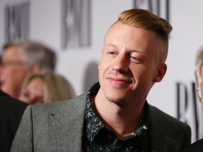 Macklemore poses at the 62nd Annual BMI Pop Awards in Beverly Hills, California, May 13, 2014. REUTERS/Danny Moloshok