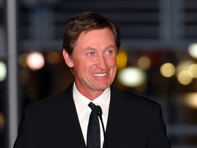 Wayne Gretzky has a deal with G.P. Putnam’s Sons for a book about the game’s history and his own place in it. The book, currently untitled, will be published this fall, coinciding with the league’s 99th anniversary. (Mark J. Terrill/AP Photo/Files)