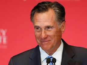 Former Republican U.S. presidential nominee Mitt Romney pauses and smiles as he delivers a speech criticizing current Republican presidential candidate Donald Trump at the Hinckley Institute of Politics at the University of Utah in Salt Lake City, Utah March 3, 2016.  (REUTERS/Jim Urquhart)