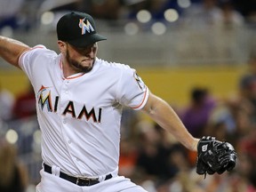 Carter Capps of the Miami Marlins pitches during a game against the San Francisco Giants at Marlins Park on June 30, 2015 in Miami. (Mike Ehrmann/Getty Images/AFP)