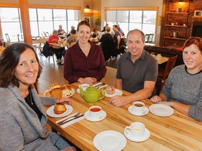 In the process of expanding their bakery Bread & Butter, owners Wendy, left, and Wayne Whitall, with their daughters Katie, second from left, and Hilary, opened Toast & Jam in the space next door at 1530 Bath Rd.
(Julia McKay/The Whig-Standard)