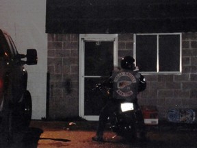 A man identified by police as Rod Sweeney, a Manitoba Hells Angel (HA), on Oct. 29, 2011 outside the Redlined clubhouse.
