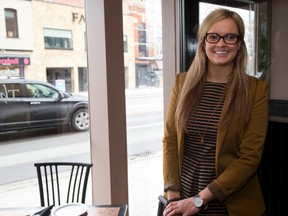 Caylin Kenney, a waitress at The Tasting Room, found an envelope with $7,000 on her table after her customers have left. She managed to get the cash back to the rightful owner, who left her $2,000 for her honesty. Mike Hensen/The London Free Press/Postmedia Network