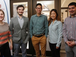 The Queen's University School of Policy Studies 2016 team, Kelsey Munroe, left to right, Mitchell Guerreiro, Matthew Chan, Kristi Choi and Tyler Brough, seen here at the Robert Sutherland Hall in Kingston, finished third at the fourth annual Canadian Association of Programs in Public Administration (CAPPA)/Institute of Public Administration of Canada (IPAC) National Case Competition. (Julia McKay/The Whig-Standard)