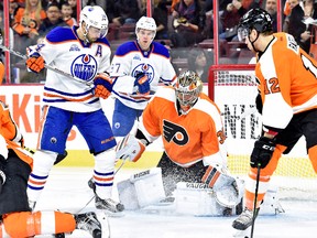 Mar 3, 2016; Philadelphia, PA, USA; Edmonton Oilers right wing Jordan Eberle (14) looks for rebound as Philadelphia Flyers goalie Michal Neuvirth (30) makes a save during the first period at Wells Fargo Center. Mandatory Credit: Eric Hartline-USA TODAY Sports