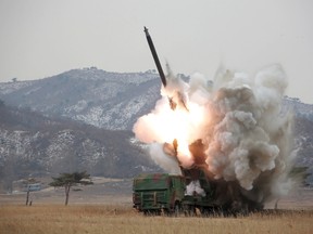 A new multiple launch rocket system is test fired in this undated photo released by North Korea's Korean Central News Agency (KCNA) in Pyongyang, on March 4, 2016. (REUTERS/KCNA)