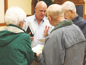Phil Salgado, president of Nuvera Community Living, talks to a group of seniors at the Vulcan Lodge Hall Feb. 22 following his presentation regarding the proposed Vulcan Village for Seniors development. More than 100 people attended the open house. Derek Wilkinson Vulcan Advocate