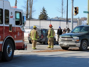 Emergency Services respond to a three-vehicle collision at the intersection of Concession, Stephen and Alfred streets in Kingston, Ont. on Friday March 4, 2016. Steph Crosier/Kingston Whig-Standard/Postmedia Network