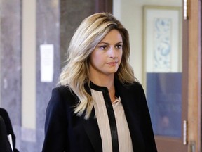 Sportscaster and television host Erin Andrews walks to the courtroom in Nashville, Tenn., on Friday, March 4, 2016. Andrews' $75 million lawsuit against the franchise owner and manager of a luxury hotel and a man who admitted to making secret nude recordings of her in 2008 is scheduled to go to the jury Friday. (Mark Humphrey/AP Photo)