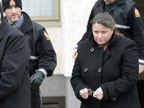 Kevin and Tammy Goforth are led out of Queen's Bench Court in Regina after being sentenced on March 4, 2016.  (BRYAN SCHLOSSER/POSTMEDIA NEWS)