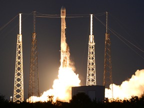 A SpaceX Falcon 9 rocket lifts off from Cape Canaveral Air Force station Friday, March 4, 2016.  The rocket is carrying the SES-9 communications satellite.  (Craig Bailey/Florida Today via AP)