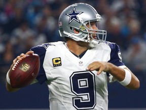 Tony Romo of the Dallas Cowboys looks to throw against the Carolina Panthers in the first quarter at AT&T Stadium on November 26, 2015 in Arlington, Texas.  (Tom Pennington/Getty Images/AFP)