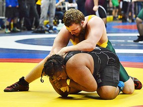 Centennial's Curtis Cournyea competes at the OFSAA wrestling championships in Windsor. He won a bronze medal in his weight class. (Catherine Frost for The Intelligencer)