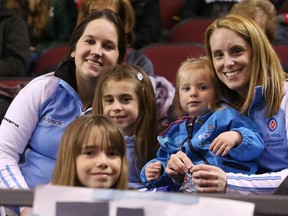 L to R: Sacha Beauchamp, Liliane Gaudreau (bottom L), Marie-Soleil Lemay, Alexandra Lemay and Mom Annie Lemay (R) support Team Quebec at the Tim Hortons Brier at TD Place in Ottawa, March 05, 2016.
Photo by 
Jean Levac